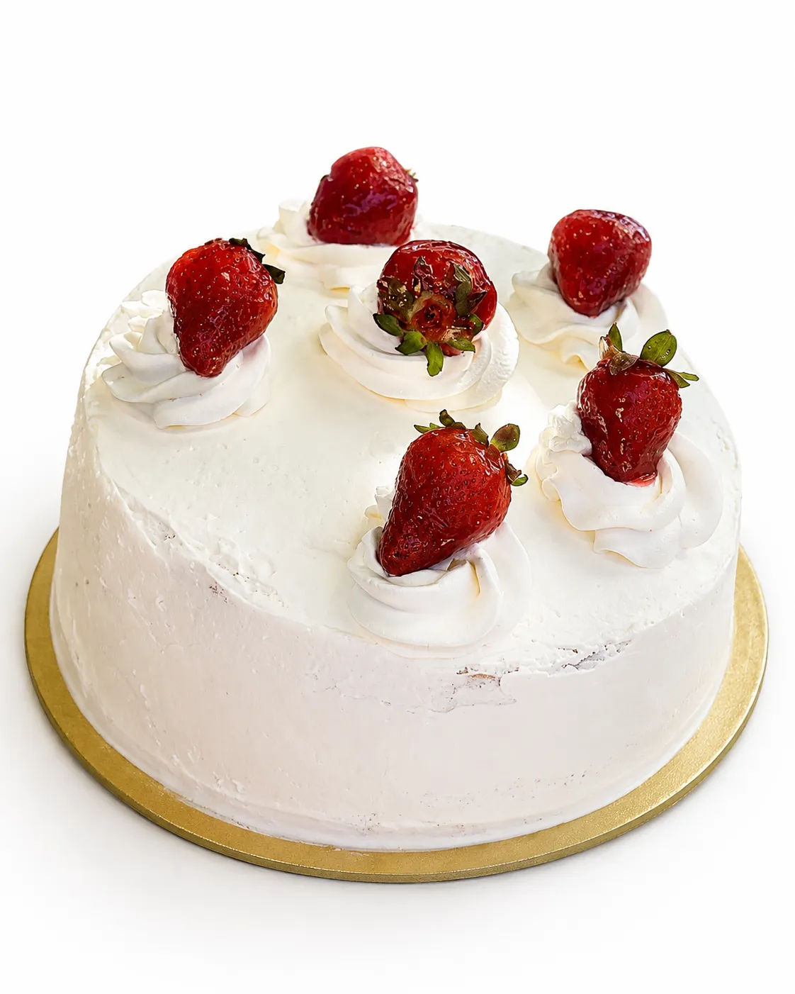 Torta de crema blanca con seis rosetones de merengue coronados con frutillas, sobre base dorada.